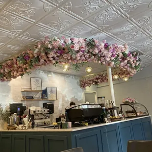 Rose decorated coffee bar.