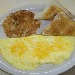 an omelet, toast, and hash browns