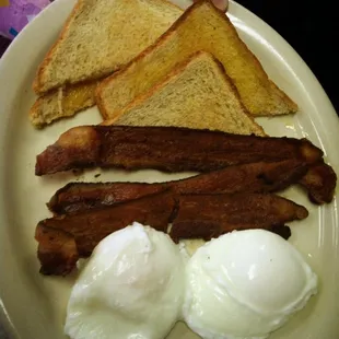bacon, eggs, and toast on a plate
