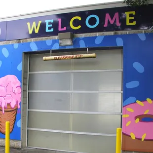 the entrance to a donut shop