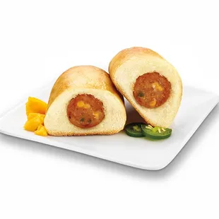 two hot dogs on a plate
