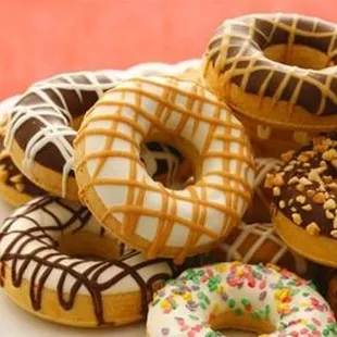 a plate of assorted donuts