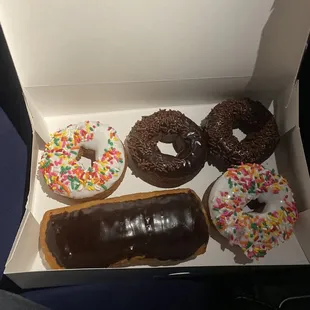 a variety of donuts in a box