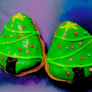 two decorated christmas trees on a plate