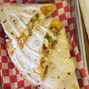 a plate of quesadillas and a bowl of salsa