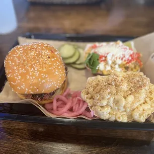 Brisket sandwich, hot street corn and Mac and cheese
