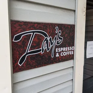 a sign on the side of a building