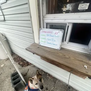 Walkup window around the back (ring bell for service)