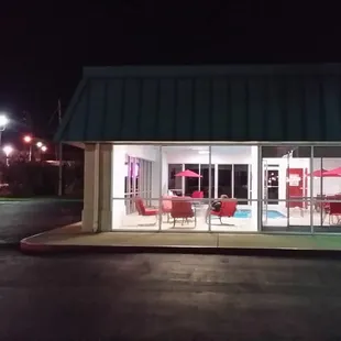 If you arrive late, look for the red-furnished pool room at the front of the building. And don't forget to look for the tall red sign.