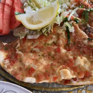 Spicy Lahmacun.  Normally, lahmacun should have ground meat on it, but the lahmacun served to us had only tomatoes on it.