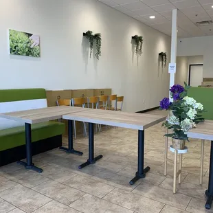 tables and benches in a waiting area