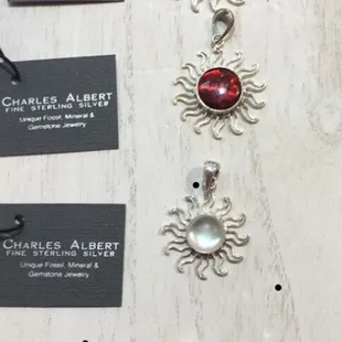 Charles Albert - Sun pendants