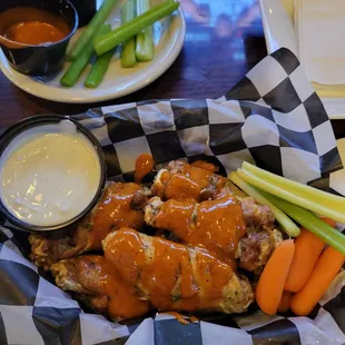 Cajun Garlic Wings w/side of celery, carrots and blue cheese and Buffalo sauce
