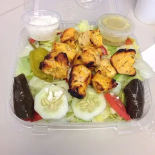 Chicken over Greek salad.