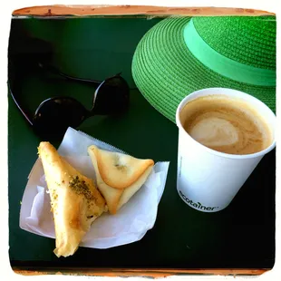 The large triangle one is the creme pastry, and the small one is the spinach pie.