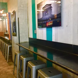 You can eat inside...lots of stools and counter space @ DC Pizza