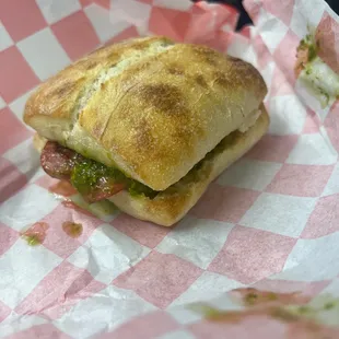 Choripan with lots of chimichurri!
