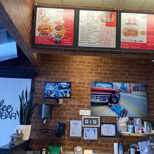 a brick wall with menus