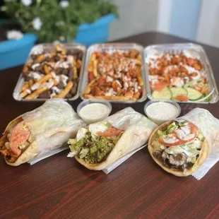 Lamb loaded fries !
chicken over rice plater !
chicken loaded fries !
Fish gyro wrap !
Falafel gyro wrap !
Lamb Gyro