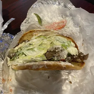 a sandwich wrapped in foil