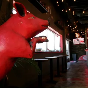 a red pig statue
