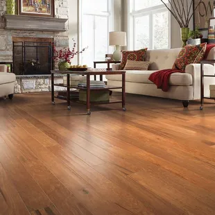a living room with hardwood floors