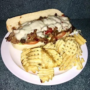Philly cheese steak with waffle fries