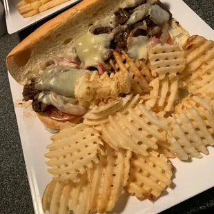 Philly cheesteak with waffle fries