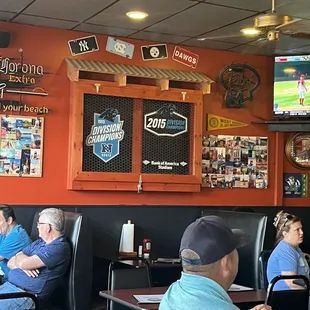 a group of people sitting in a restaurant