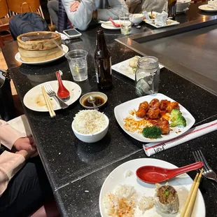 a group of people sitting at a table
