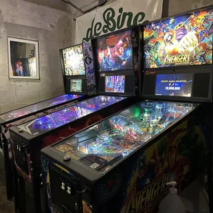 a row of pinball machines