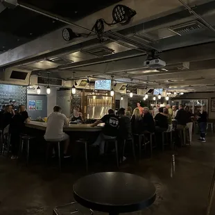 people sitting at the bar