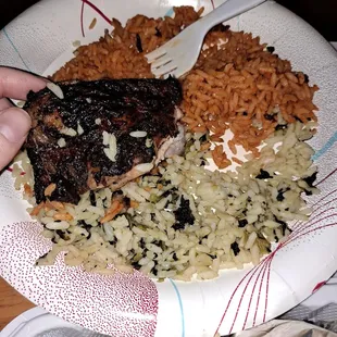 Jerk chicken and callaloo rice, along with joloff rice (joloff rice was from the Green Place Nigerian restaurant).