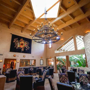 a dining room with a skylight