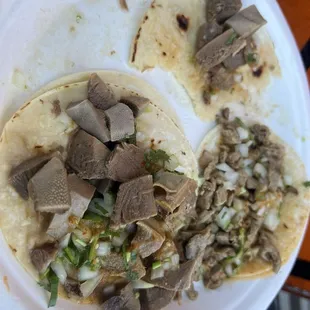 Soggy tacos of lengua and sorry tacos of asada