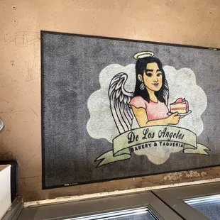 a woman holding a cupcake