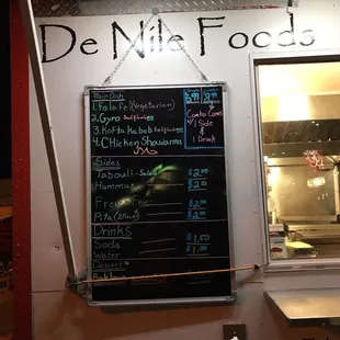 a menu on a food truck