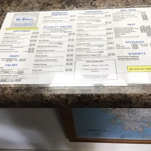a menu on a counter top
