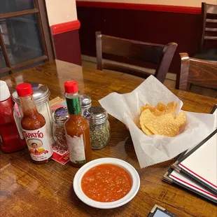 a table full of condiments and condiments