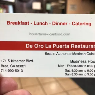 a person holding a business card