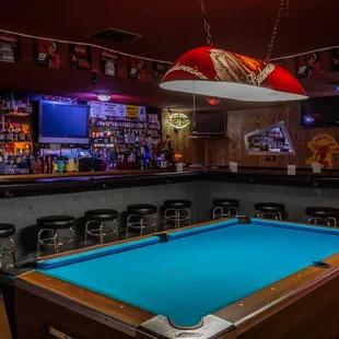 a pool table and bar