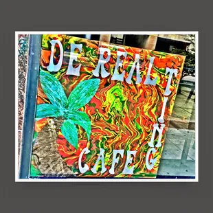 a sign with a marijuana leaf on it