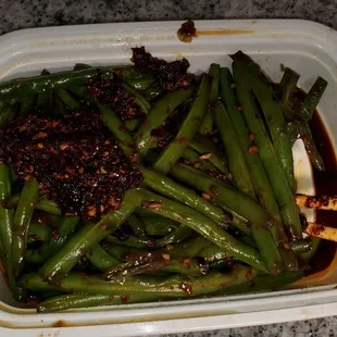 Szechuan green beans (not spicy)  Note: that dollop of chili crunch is mine, lol.