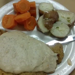 Daily Special: meat and 2 vegetables. I got the breaded cutlet w/ cream gravy, buttered potatoes and sweet carrots. Yum!