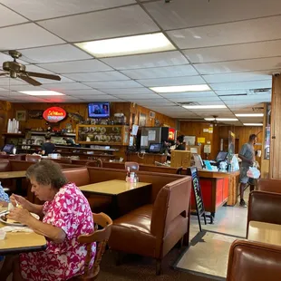 diners sitting at tables eating
