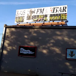 a sign on top of a building