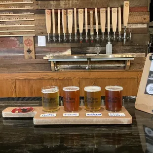 Flight in taproom at bar.
