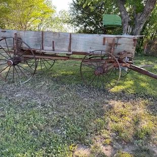 an old wagon in a field