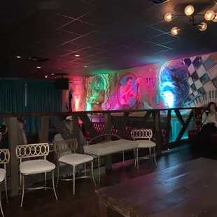 people sitting in a dark room