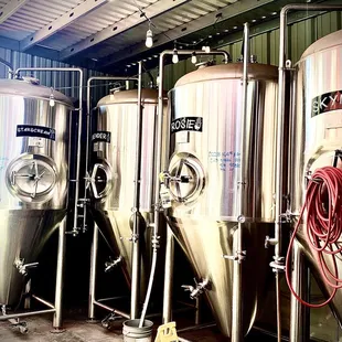 a row of beer tanks